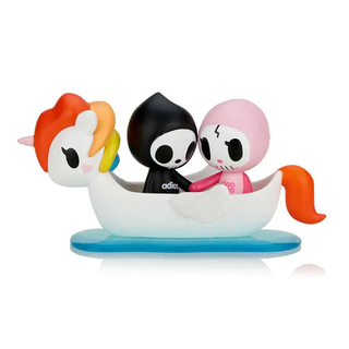 Boatload of Love figure design of Adios and Ciao Ciao holding hands while sitting in a Unicorno-themed boat.