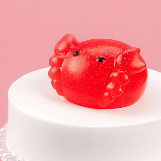 Glittery red crab squishy.