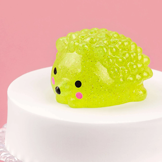 Glittery green hedgehog squishy.