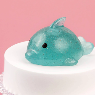 Glittery teal dolphin squishy.