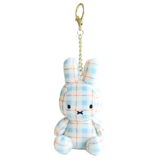 Plaid patterned Miffy plush keychain with gold keychain on a white background