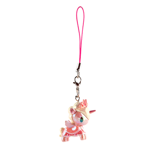 Petal Unicorno keychain. Shiny light pink Unicorno with a wavy cream mane, wearing a pink cape with frills on the trim.
